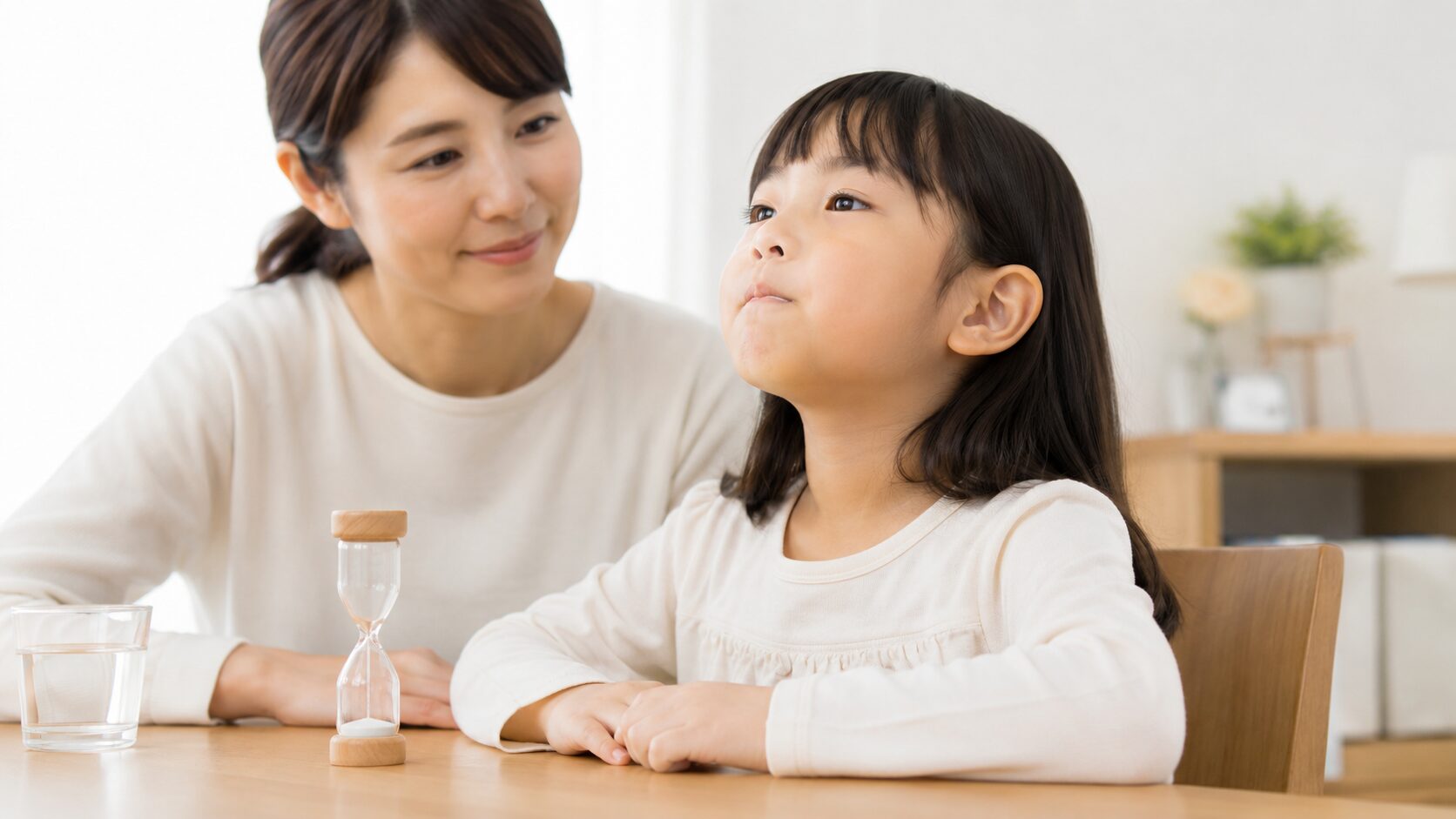 保護者が子供のシダキュア服用を見守る様子