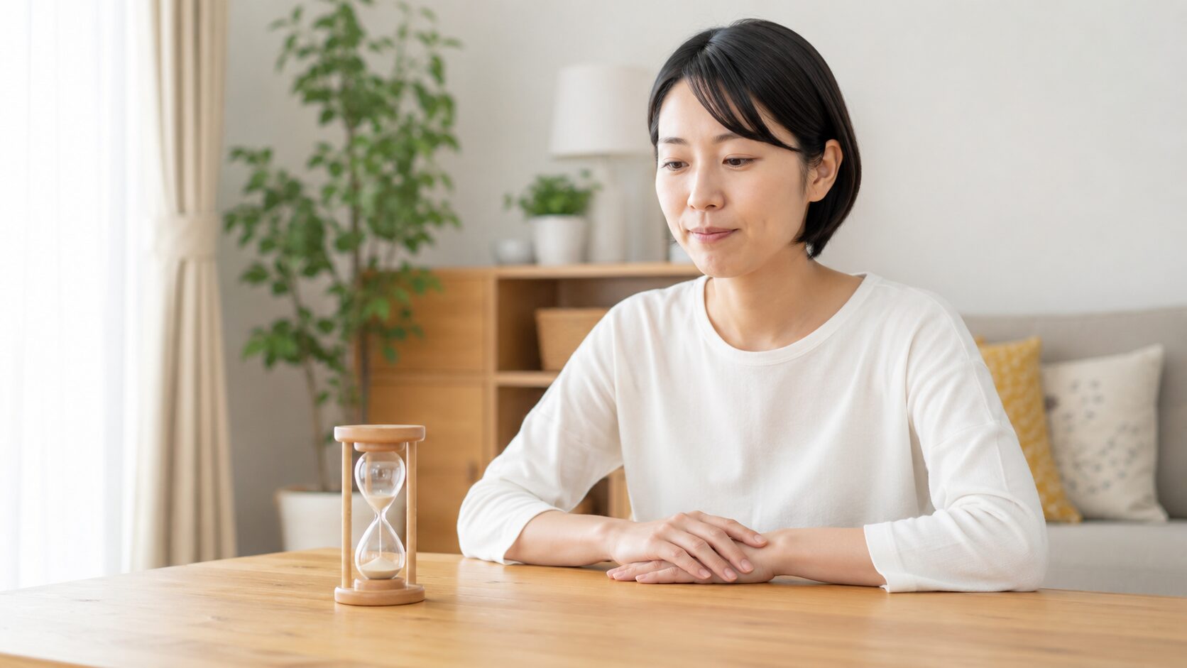 砂時計を見ながらシダキュアの舌下保持を待つ様子